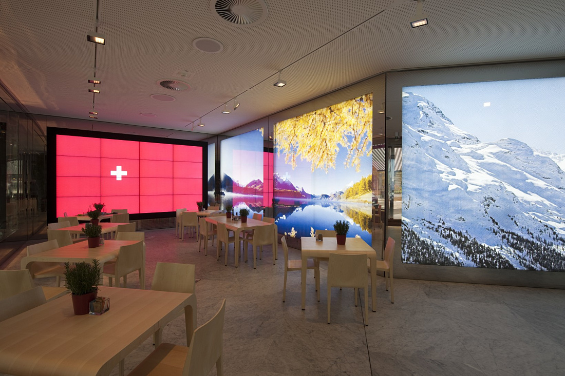 Swiss Corner Bar in Milan featuring ERCO Light Board spotlights for modern LED lighting.