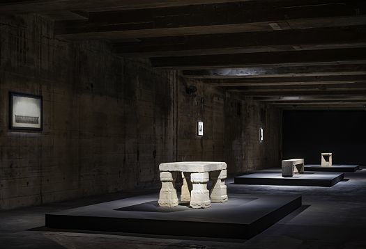 Feuerle Collection: Khmer sculpture illuminated by ERCO LED spotlights in a dark bunker, Berlin.