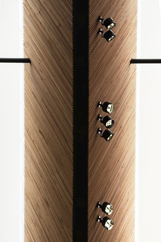 ERCO Parscan spotlights illuminate the wooden ceiling at Rosary Hill, creating accent lighting.