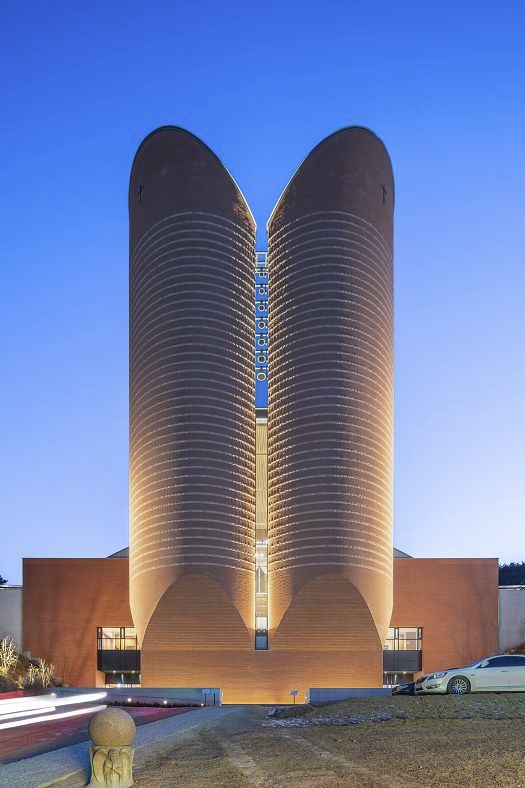 The Shrine of Our Lady of the Rosary of Namyang, illuminated by sustainable ERCO lighting.