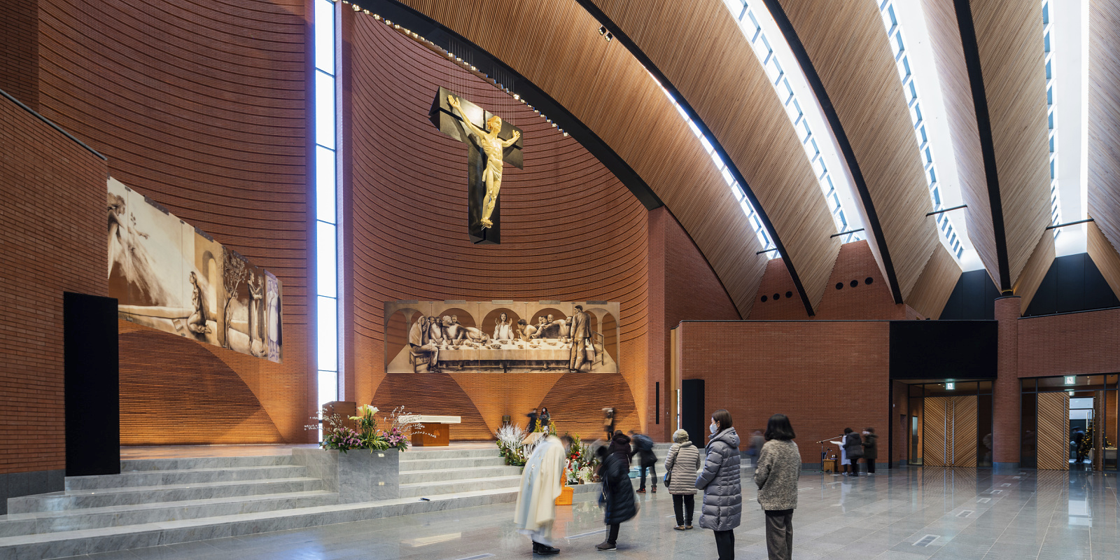Interior of Namyang Rosary Hill church featuring ERCO lighting for high visual comfort.
