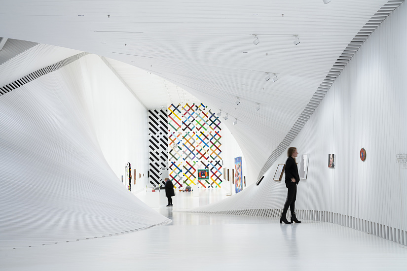 Interior of The Twist museum in Norway featuring ERCO Parscan spotlights illuminating art.