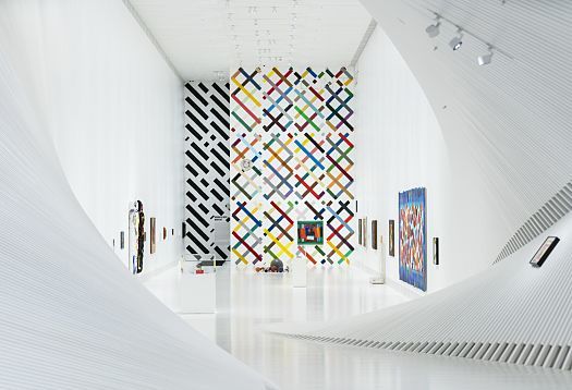 Interior of The Twist museum featuring ERCO Parscan spotlights for flexible art illumination.