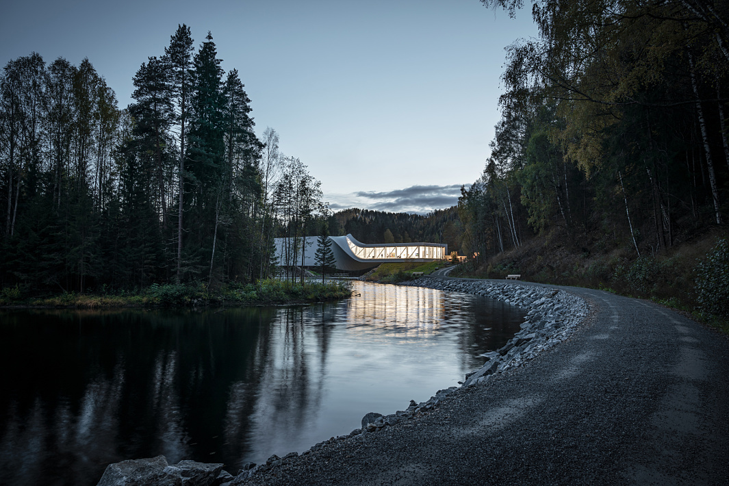 The Twist museum, a sculptural bridge illuminated by ERCO lighting, at Kistefos museum park, Norway.