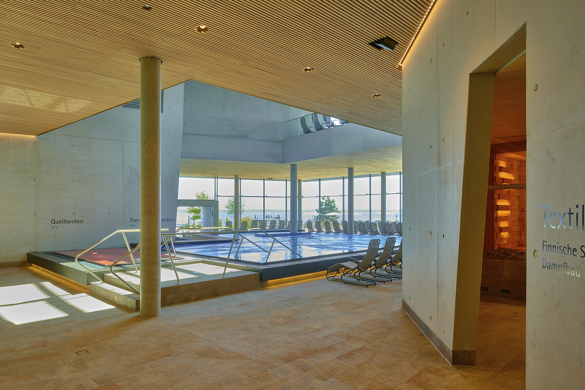 Indoor view of Therme Lindau, featuring ERCO downlights for visual comfort and robust design.