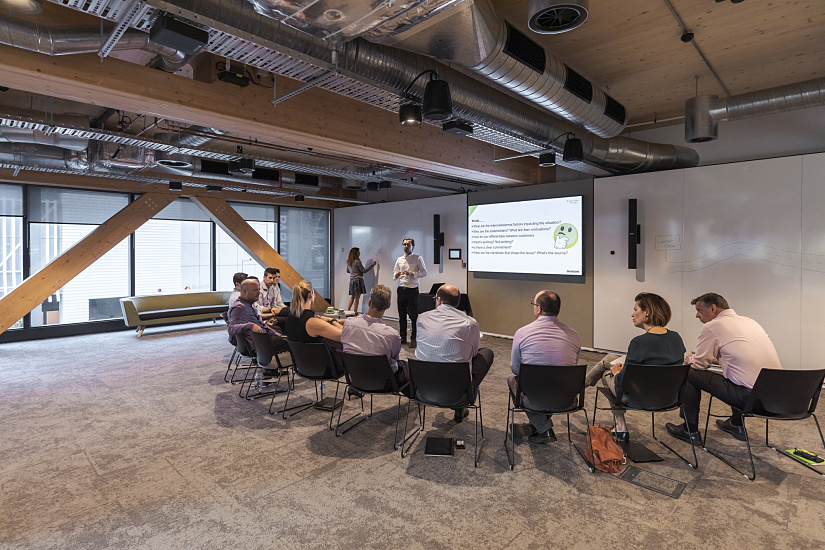 Presentation with ERCO LED lighting in a modern office at the Timber Building, Brisbane.