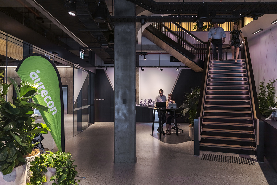 Aurecons Brisbane office featuring ERCO LED lighting, highlighting modern workspaces.