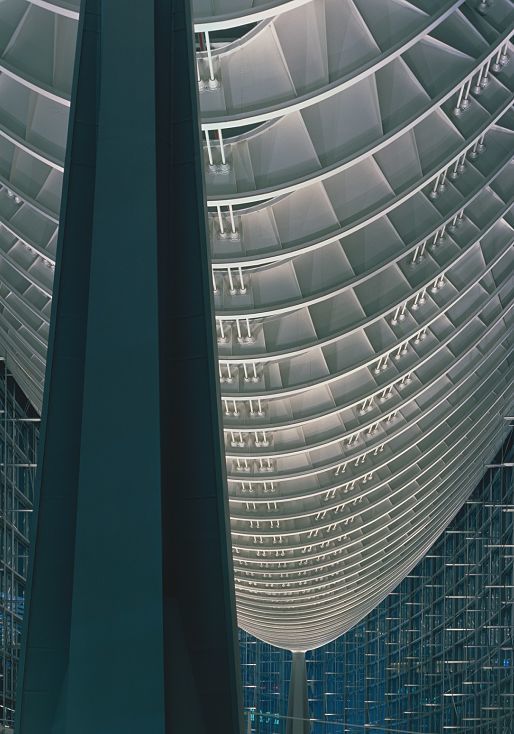 Illuminated steel structure at Tokyo International Forum, a landmark featuring ERCO lighting.
