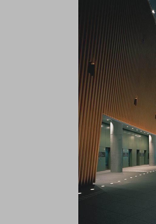 Interior of Tokyo International Forum featuring ERCO lighting, highlighting architectural lines.