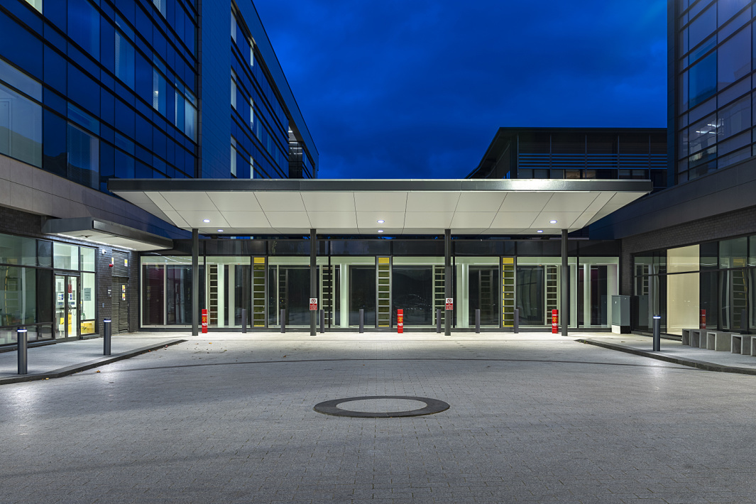 Ulster Hospital Belfast entrance featuring ERCO Castor bollards for glare-free outdoor lighting.