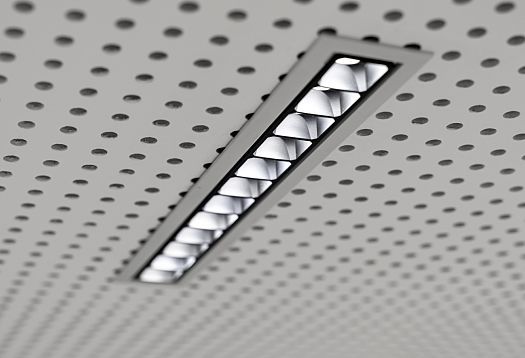 ERCO Compar linear recessed luminaire providing glare-free light in a dotted ceiling.