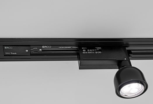 ERCO Oseris spotlight on DAU track, used in Ulster Hospital for patient-centered lighting.
