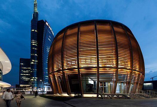 UniCredit Pavilion in Milan, illuminated by ERCO LEDs, resembling a monumental lantern.