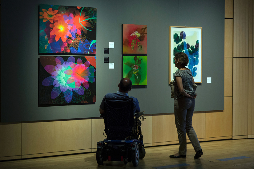 Visitors view art illuminated by ERCO LED lighting at the UniCredit Pavilion.