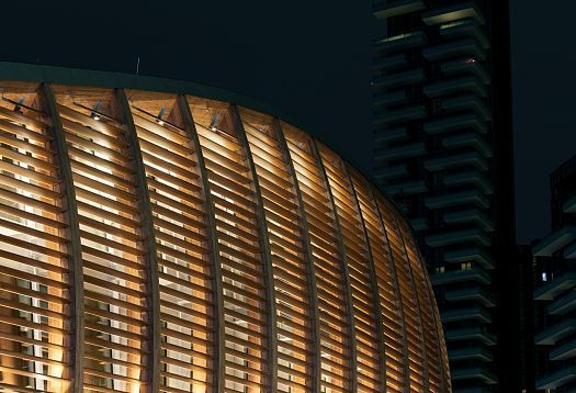 UniCredit Pavilion in Milan, illuminated with ERCO LEDs, creating a warm and inviting atmosphere.