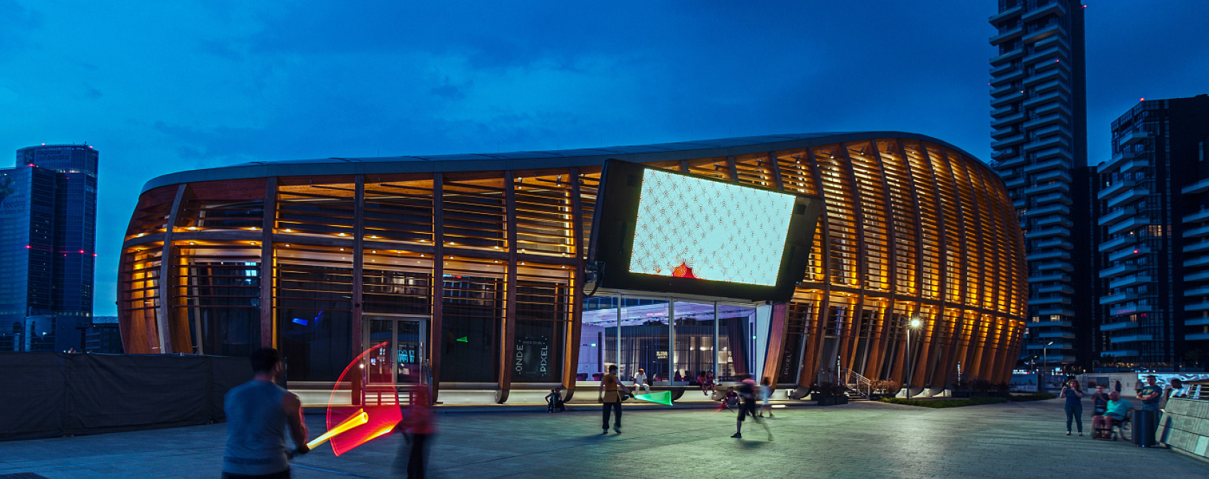 UniCredit Pavilion in Milan, illuminated by ERCO LEDs, shines like a monumental lantern.