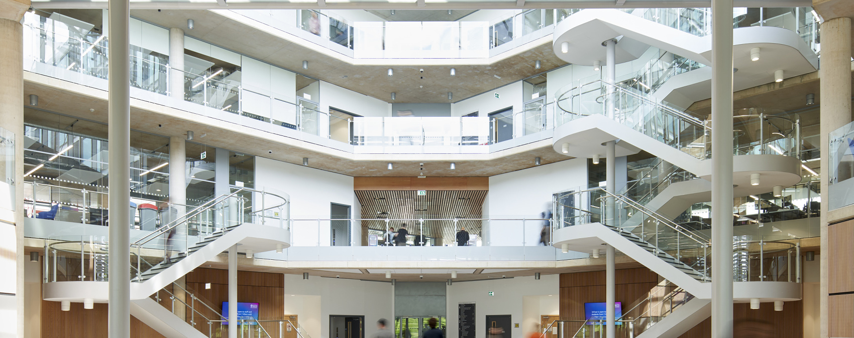 Interior of the University of Bath School of Management, featuring ERCO downlights for sustainable lighting.