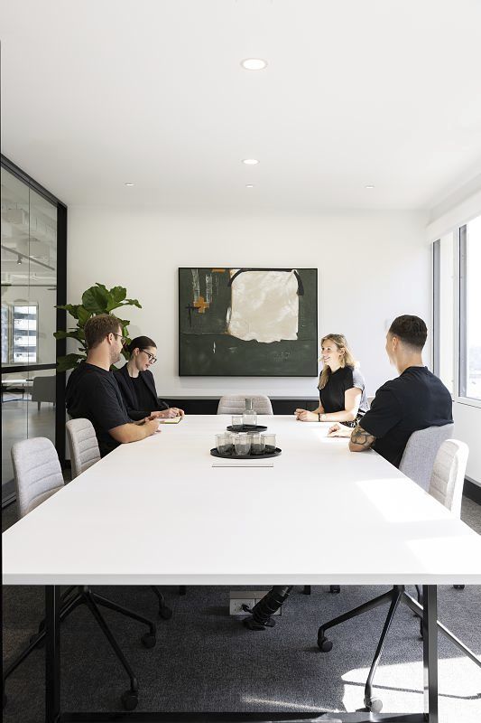 Valmont Offices conference room featuring flexible Jilly downlights for office lighting, Sydney.