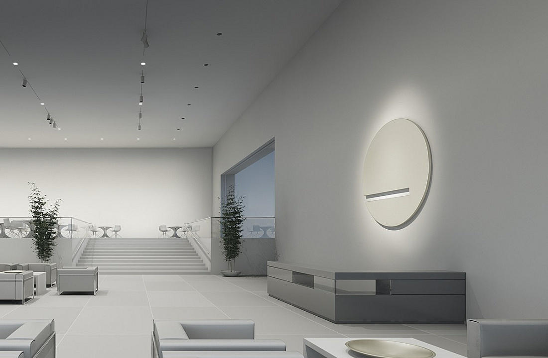 ERCO wall luminaire in a modern space, accentuating vertical illumination.