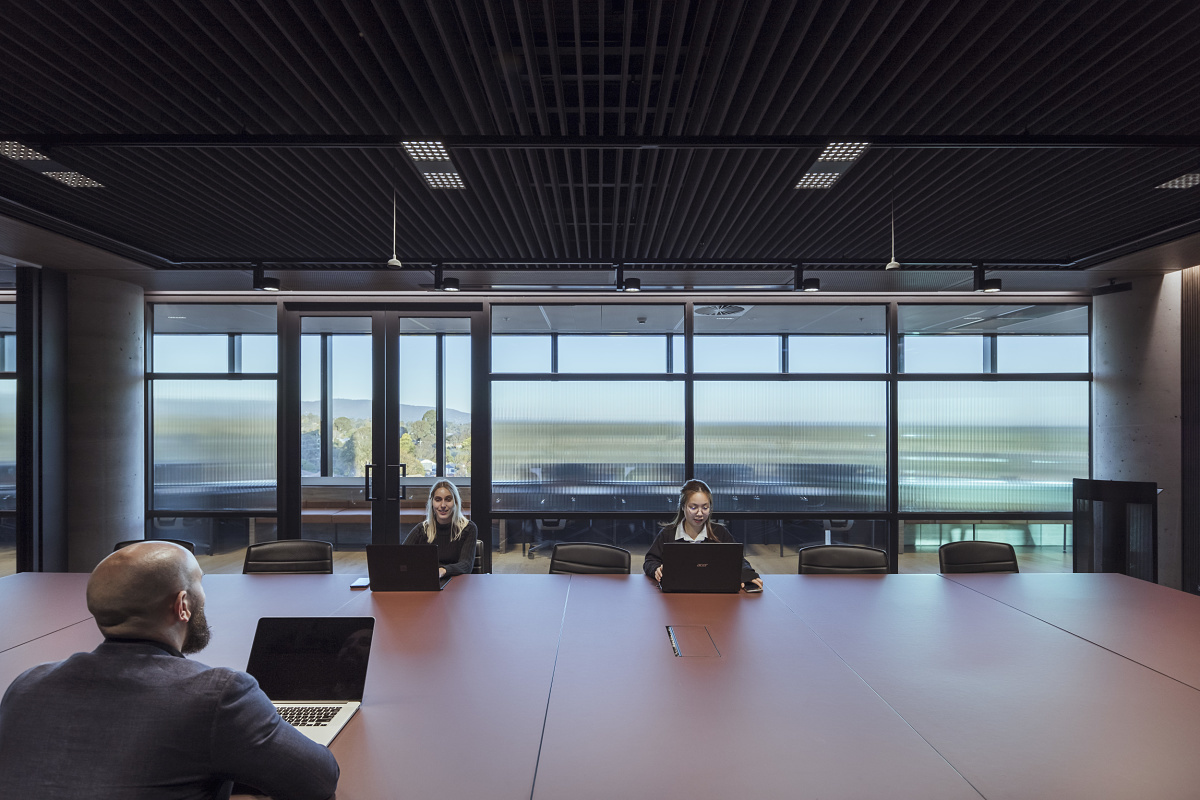 ERCO Jilly downlights illuminate a modern VicRoads office for flexible task lighting.