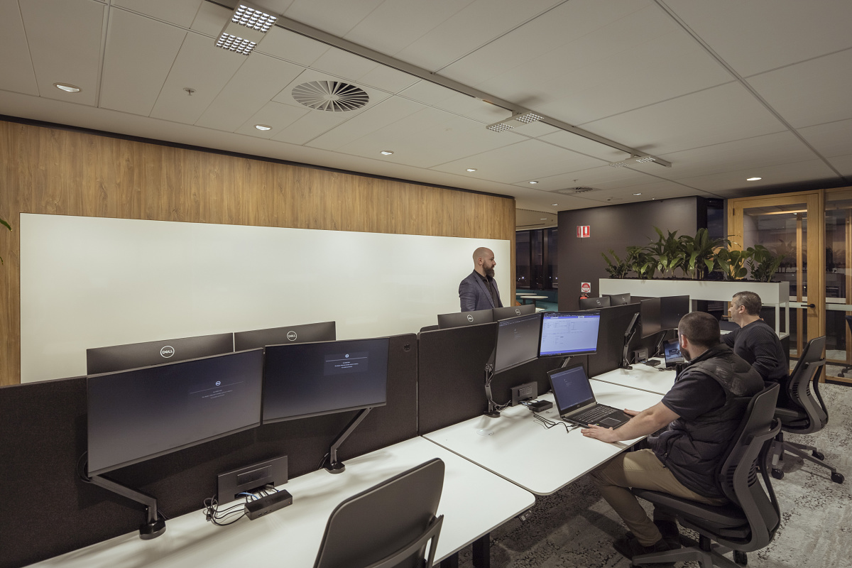 ERCO Jilly downlights provide flexible office lighting at VicRoads Customer Hub, Melbourne.