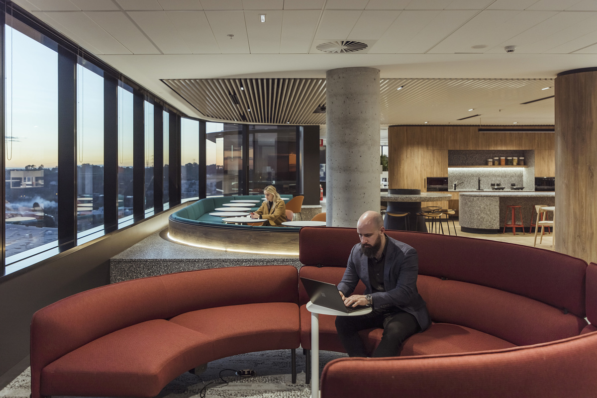 Flexible office space at VicRoads Ringwood Customer Hub, featuring ERCO lighting for a comfortable work environment.