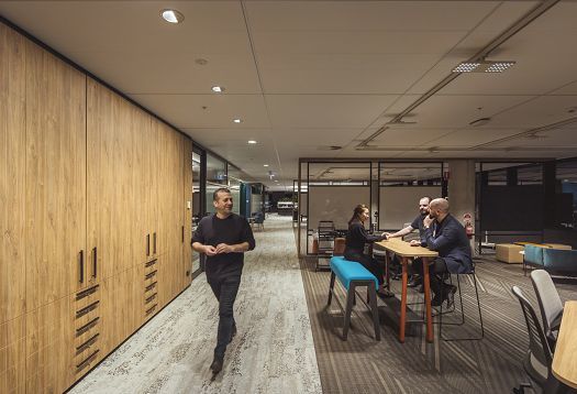ERCO Jilly downlights illuminate a modern VicRoads customer hub office with flexible lighting.