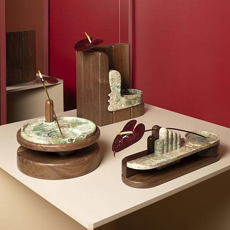 Handmade wooden and stone design objects displayed at the Wallpaper Handmade Exhibition.