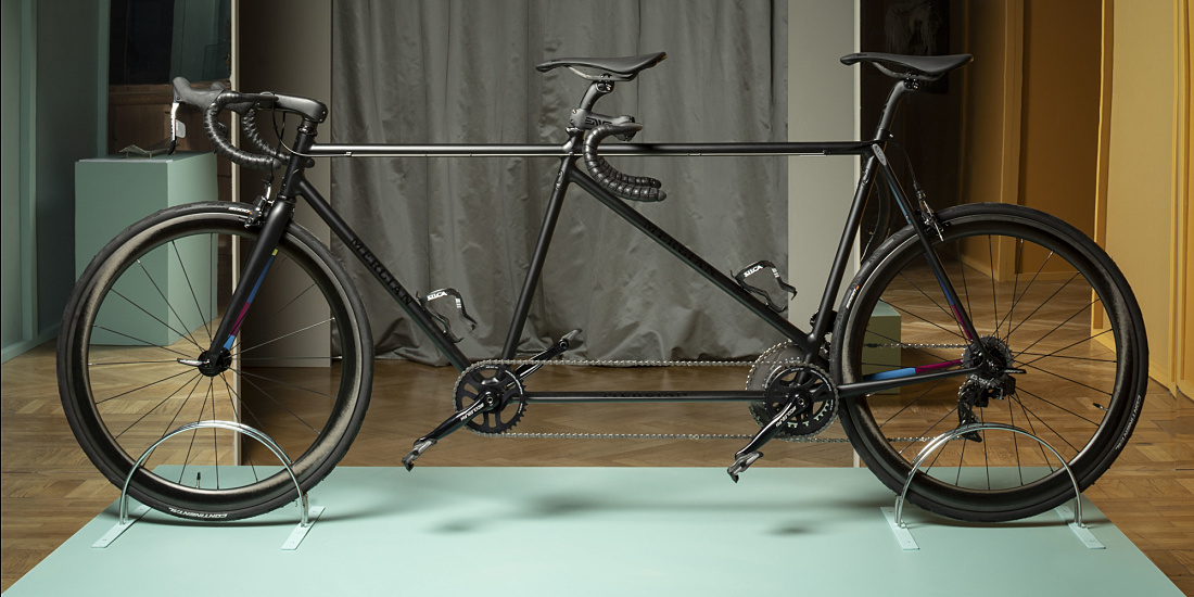 Paul Smith & Mercian tandem bike displayed at Wallpaper Handmade Exhibition, illuminated by ERCO LED lighting.