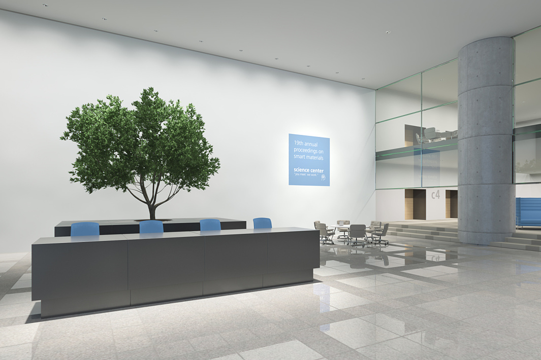 Reception area featuring a tree and ERCO lighting, creating a welcoming atmosphere in a public building.