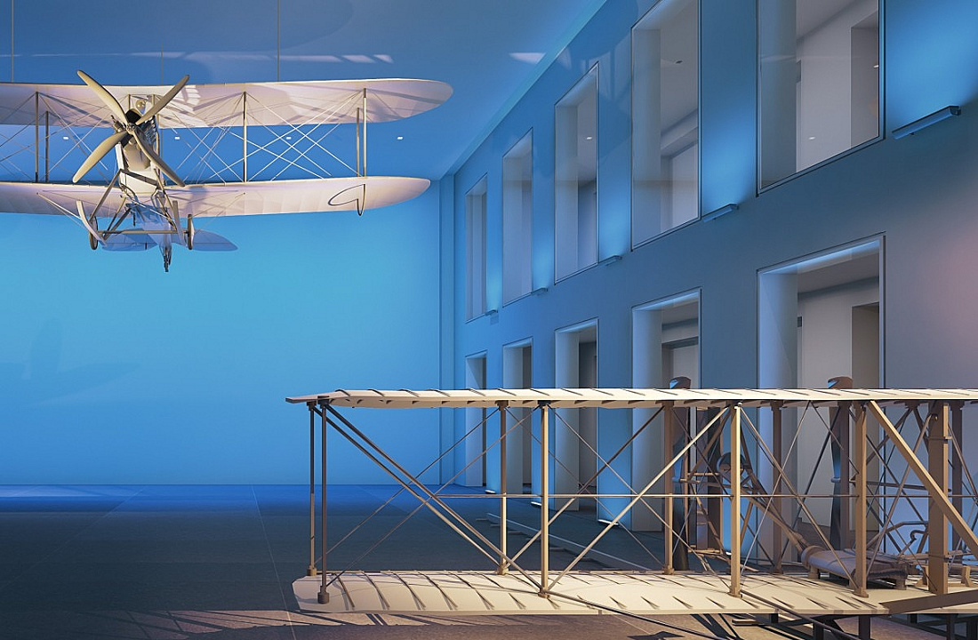 Vintage airplanes in a museum, illuminated with colored light for atmospheric effects.