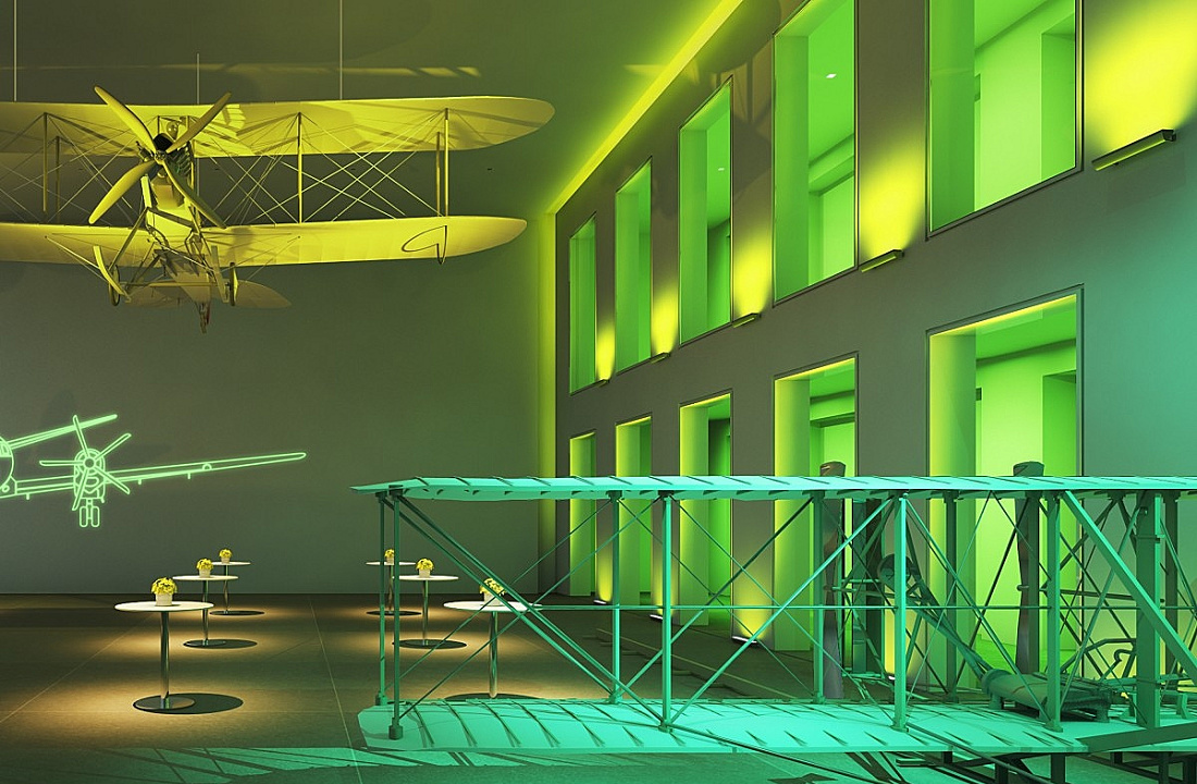 ERCO lighting design featuring colored illumination and airplane models for atmospheric spaces.