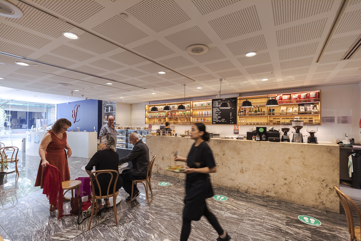 ERCO Skim recessed luminaires providing pleasant general lighting at Wholegreen Bakery, Sydney, with visual comfort.