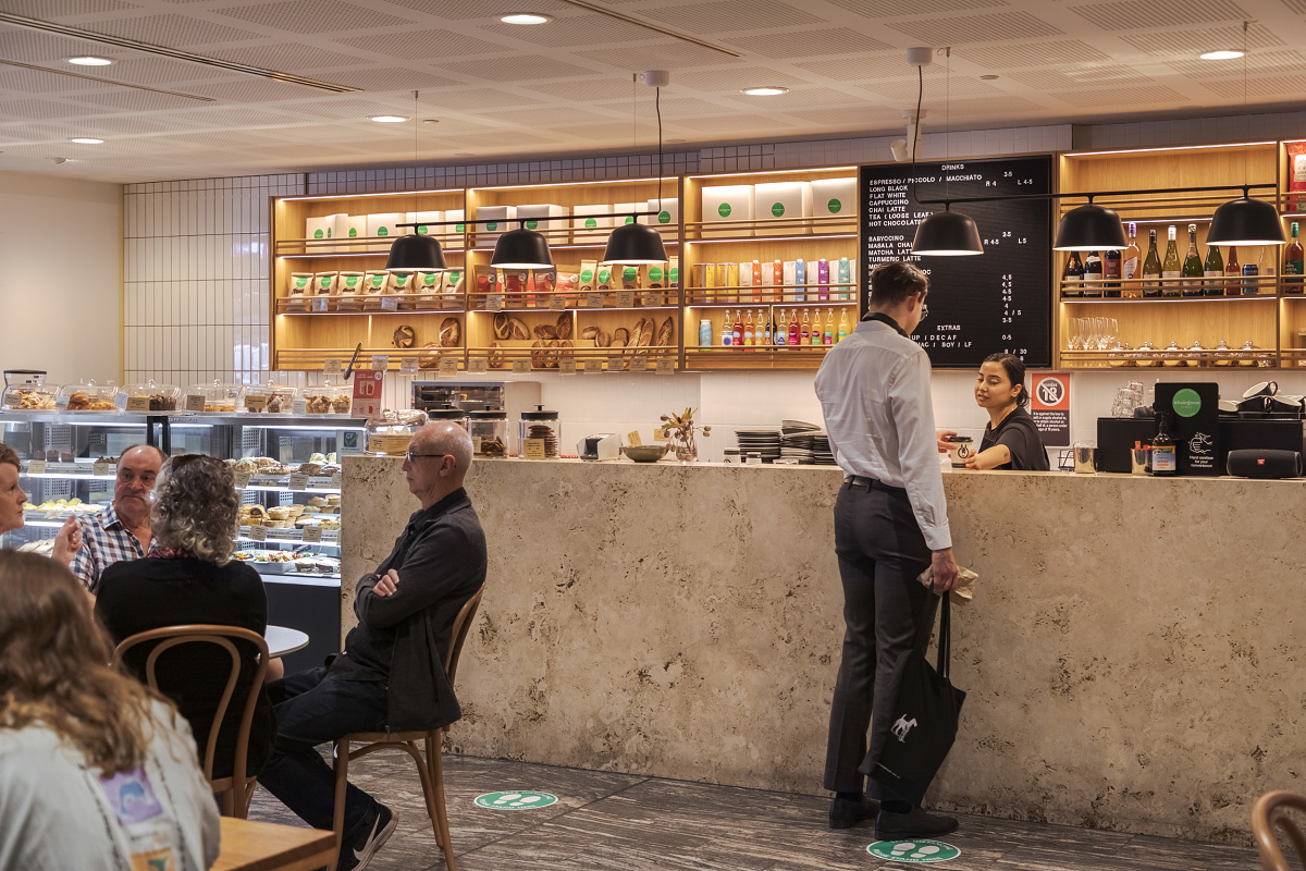 Wholegreen Bakery in Sydney, lit by ERCO Skim recessed luminaires providing pleasant general lighting.