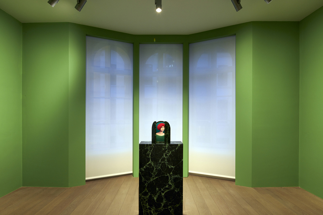 Artwork on a pedestal, lit by ERCO LED spotlights in Xavier Hufkens Gallery.