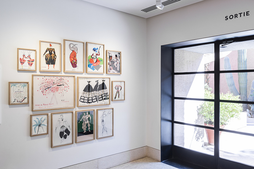 Yves Saint Laurent Museum Marrakesh: Fashion sketch exhibit illuminated by ERCO LED spotlights.