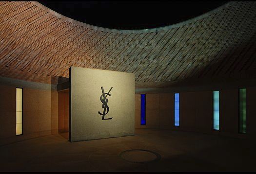 Yves Saint Laurent Museum Marrakesh interior featuring the YSL logo and colored windows.