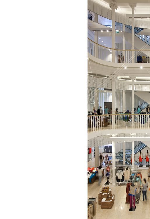 Multi-level ZARA store in Rome featuring ERCO lighting for vertical product presentation.